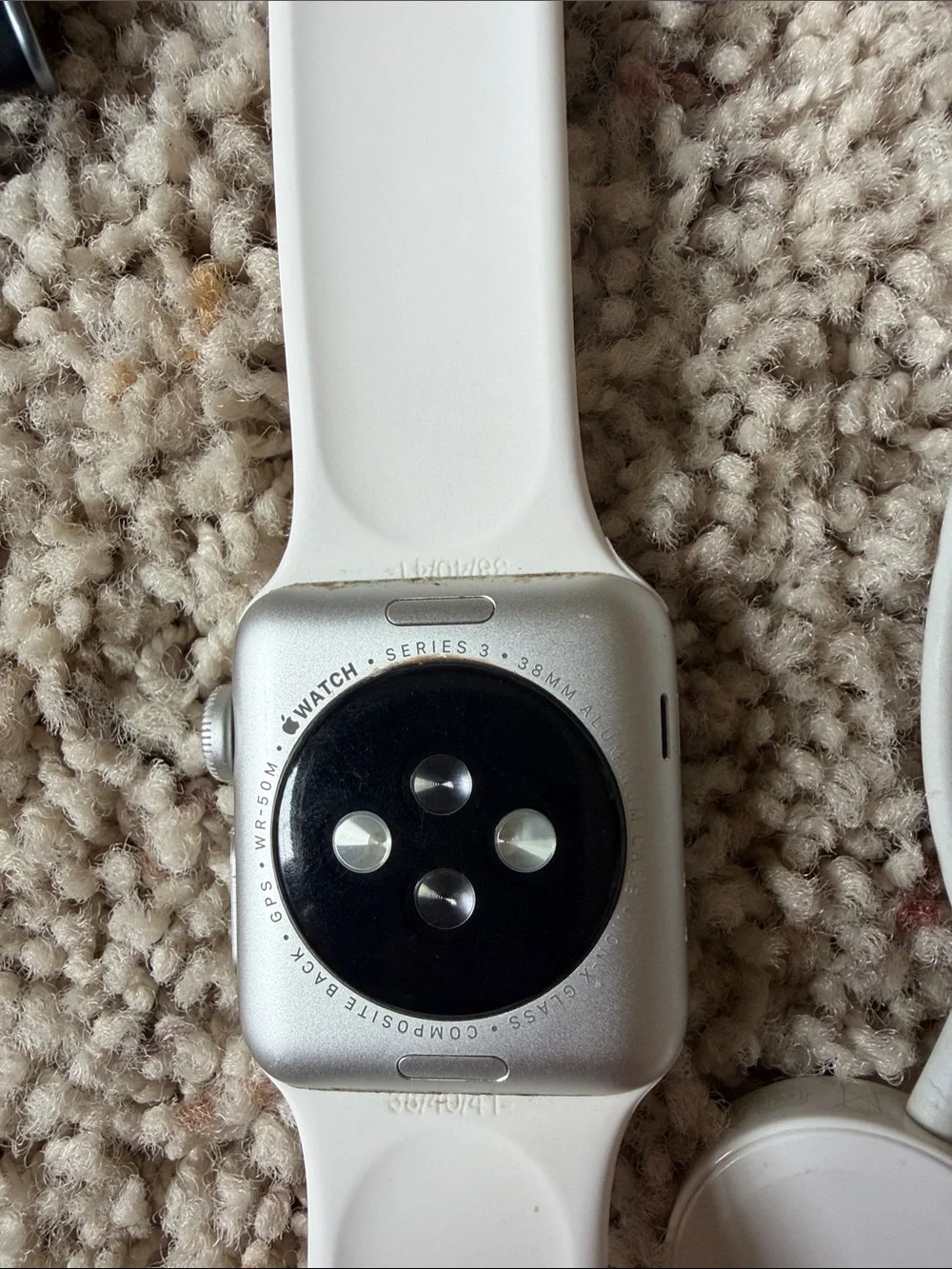 White Apple Watch Series 3 with Extra Bands and Magnetic Charger